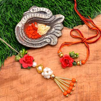 Handcrafted pearl & gold bead rakhi 2
