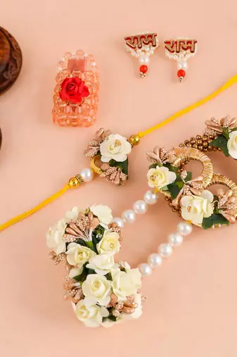 Handcrafted pearl & gold bead rakhi
