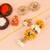 Handcrafted pearl & gold bead rakhi