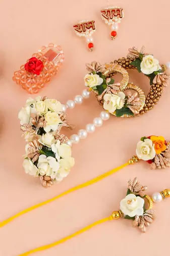 Handcrafted pearl & gold bead rakhi