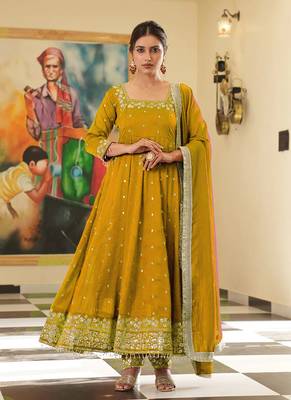 Yellow colour vichitra silk embroidery work fully  gown 1