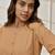 Women's beige cambric cotton yoga kurta with front open design & three quarter sleeves