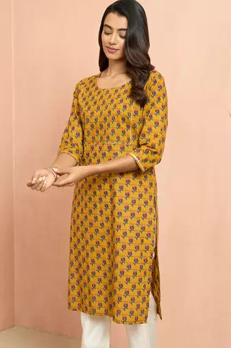 Womustard floral pleated kurta - traditional rakhi dress with pleated yoke design