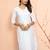 Women's white cotton chikankari kurta - traditional raksha bandhan outfit with paisley embroidery