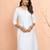 Women's white cotton chikankari kurta - traditional raksha bandhan outfit with paisley embroidery