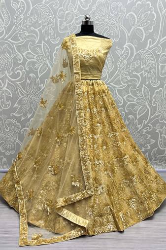 Golden Net Heavy Fancy Embroidered Designer Lehenga Choli