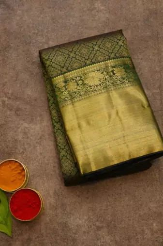 Dark green pattu saree for wedding