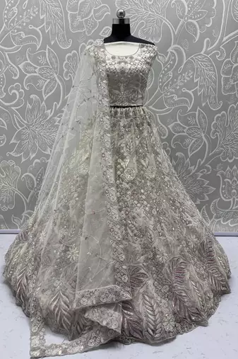 Off White Net Heavy Fancy Embroidered Designer Lehenga Choli
