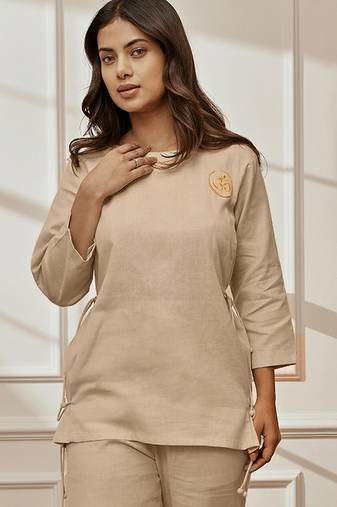 Women's beige linen cotton yoga top with ethnic embroidery & side tie-up detail