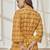 Women's yellow printed cotton wrap around yoga top with ethnic motifs & shawl collar