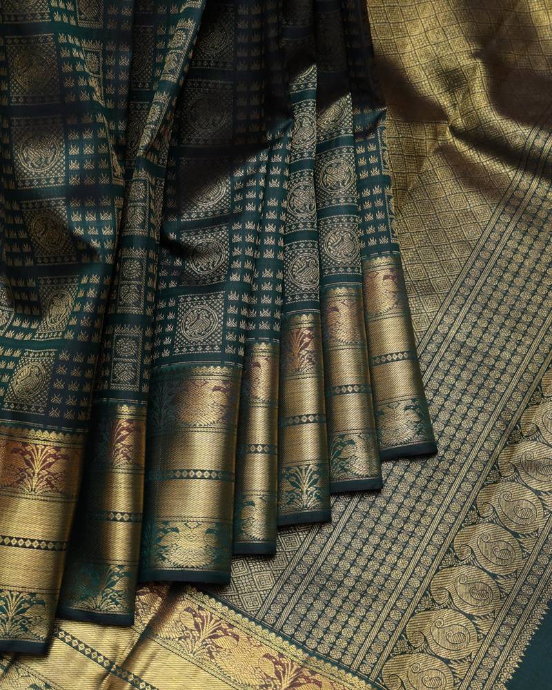 Deep green and gold pure zari silk saree