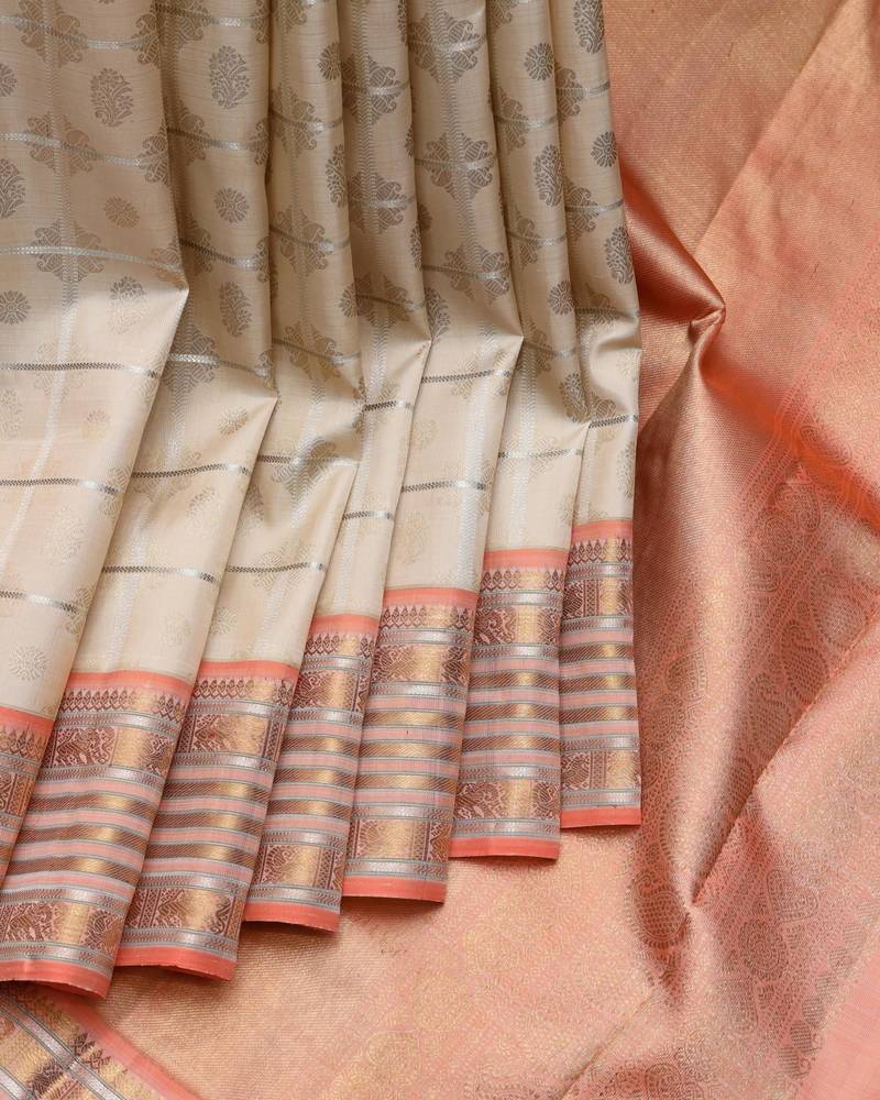 Cream and peach pure zari silk saree
