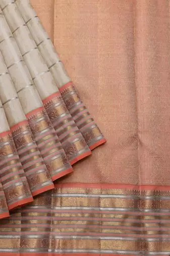 Cream and peach zari silk saree 