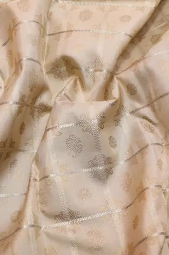 Cream and peach zari silk saree 