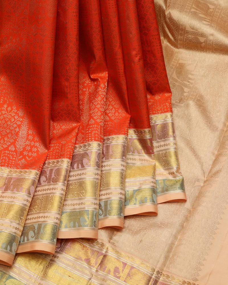 Orange and gold pure zari silk saree