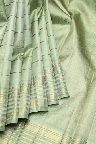 Mint green pure zari silk saree with silk mark certified