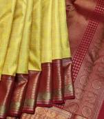 Lemon yellow and maroon pure zari silk saree with silk mark certified