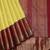 Lemon yellow and maroon pure zari silk saree
