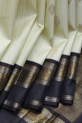 White and black pure zari silk saree with silk mark certified