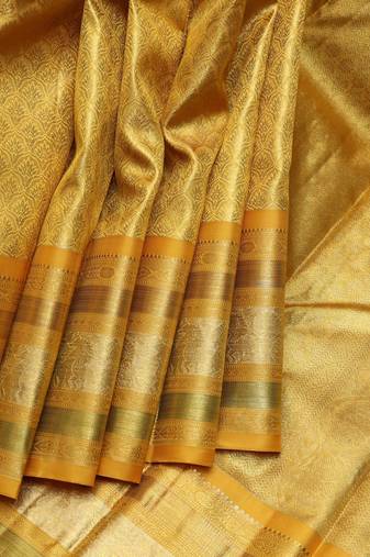 Golden mustard pure zari tissue silk saree