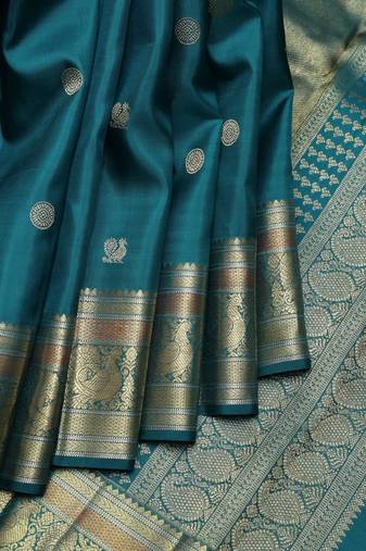 Peacock green pure zari silk saree