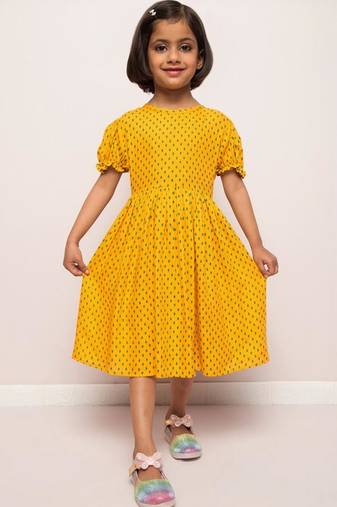 Printed frock in rayon fabric with elasticated sleeves