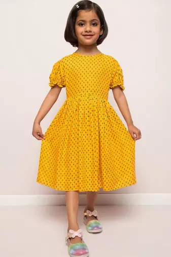 Printed frock in rayon fabric with elasticated sleeves