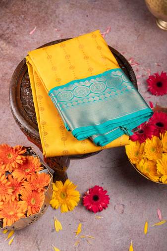 Mustard and green semi silk saree