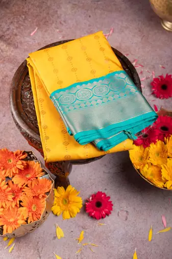 Mustard and green semi silk saree