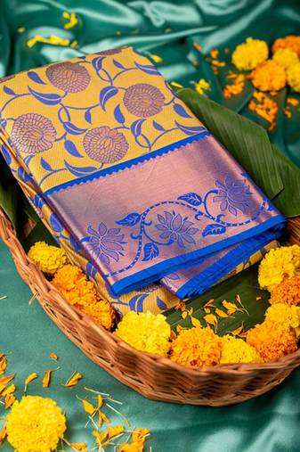 Yellow brocade semi soft silk saree