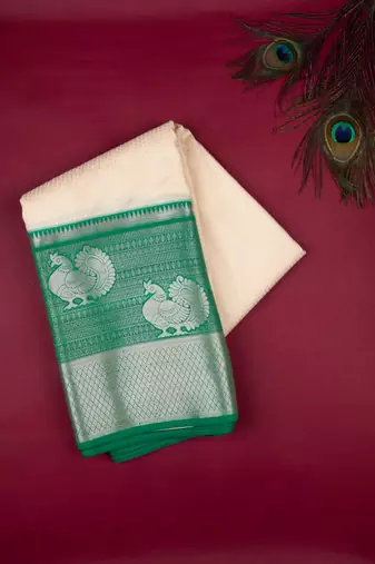 Offwhite and green semi silk saree