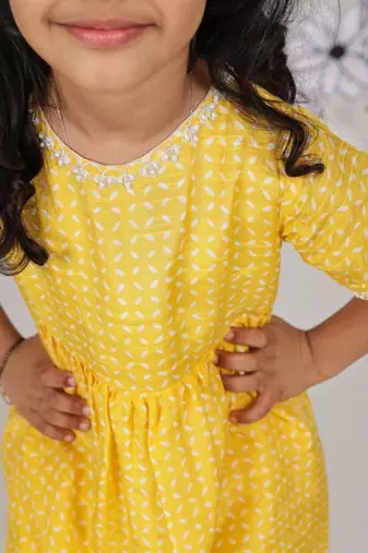 Sunshine sparkle girls sharara set yellow printed festive wear