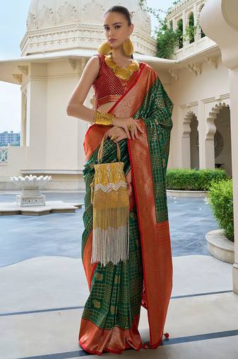 Green banarasi silk blend jacquard woven saree with blouse