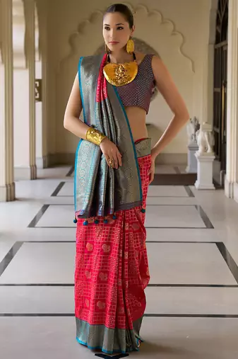 Rani pink banarasi silk blend jacquard woven saree with blouse