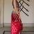 Rani pink banarasi silk blend jacquard woven saree with blouse