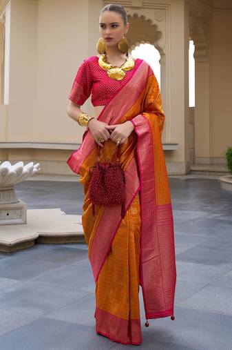 Orange banarasi silk blend jacquard woven saree with blouse