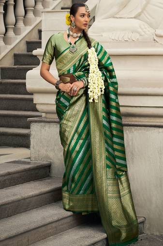 Green banarasi silk blend jacquard woven saree with blouse