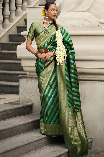 Green banarasi silk blend jacquard woven saree with blouse