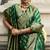 Green banarasi silk blend jacquard woven saree with blouse