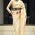 Cream banarasi silk blend jacquard woven saree with blouse