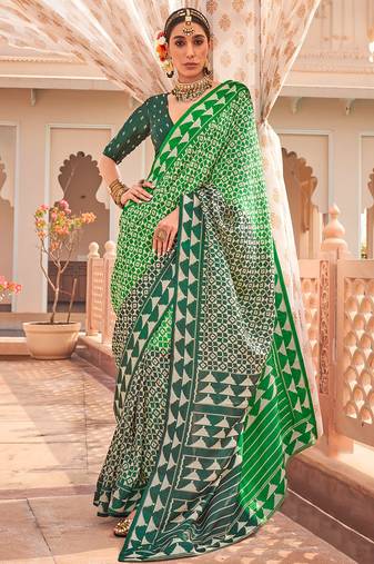 Green silk blend patola print saree with blouse