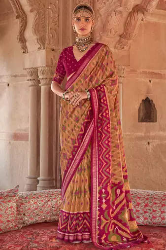 Mustard georgette patola print saree with blouse