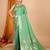 green banarasi silk blend meenakari zari weaving saree with tassels on pallu