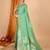 green banarasi silk blend meenakari zari weaving saree with tassels on pallu