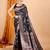 black banarasi silk blend meenakari zari weaving saree with tassels on pallu