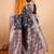 black banarasi silk blend meenakari zari weaving saree with tassels on pallu