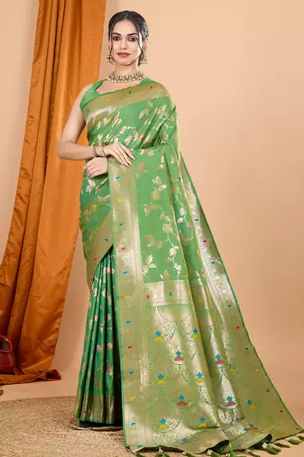 green banarasi silk blend meenakari zari weaving saree with tassels on pallu