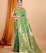 green banarasi silk blend meenakari zari weaving saree with tassels on pallu