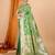 green banarasi silk blend meenakari zari weaving saree with tassels on pallu