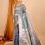 grey banarasi silk blend meenakari zari weaving saree with tassels on pallu